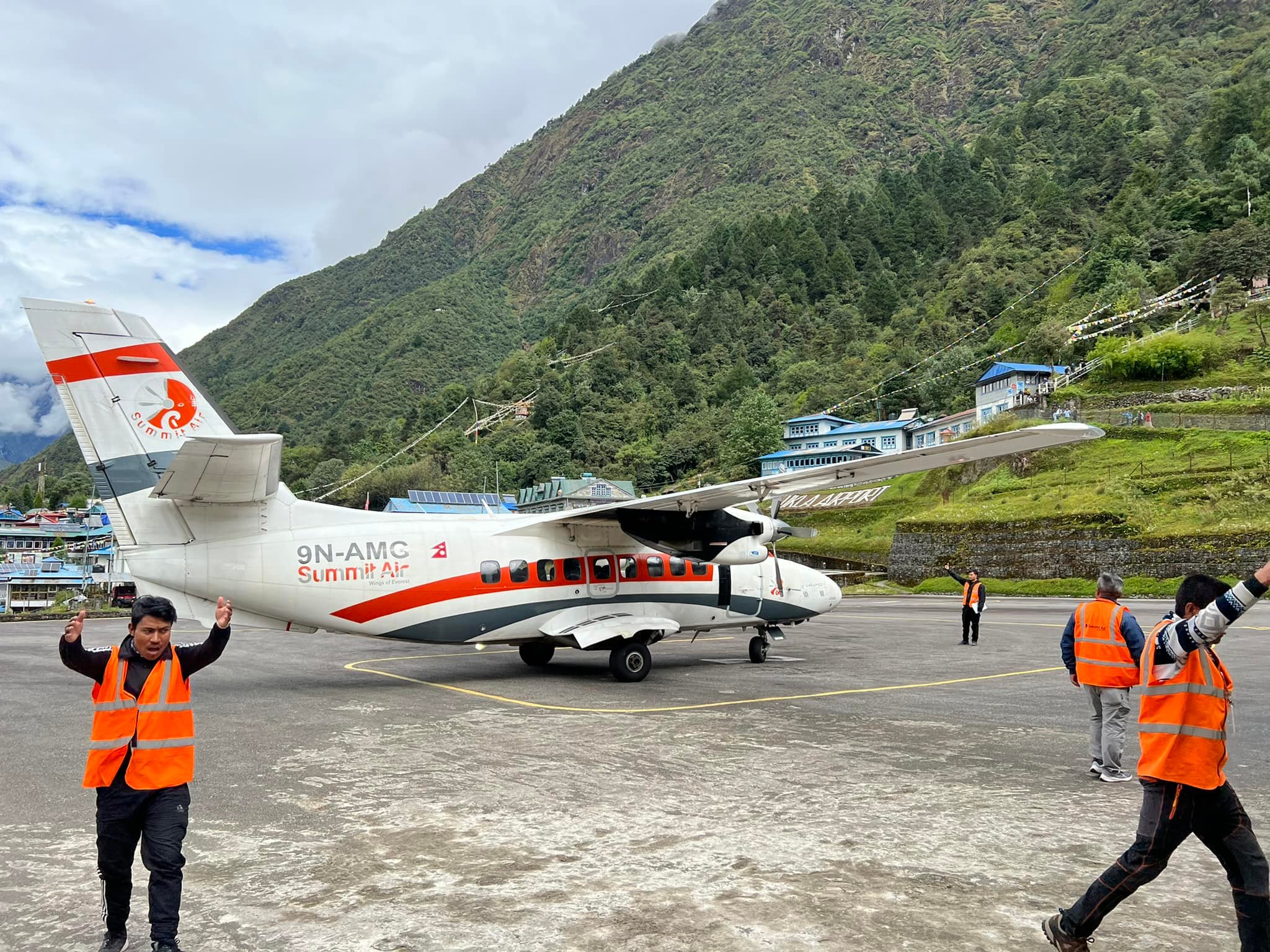 Lukla Airport & Summit air is waiting for the passengers to on board