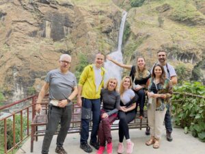 Chyamche Waterfall & Happy Mountain Nepal clints taking groupPicture
