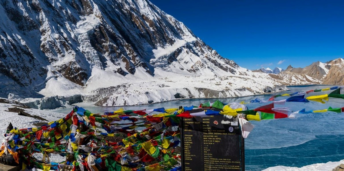 Tilicho lakewith lots of prayers flags at Tilicho Pass