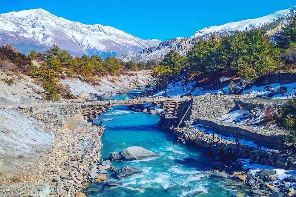 a bridge on the way to Upper pissang from Dhukurpokhari & shantidada seen in the background
