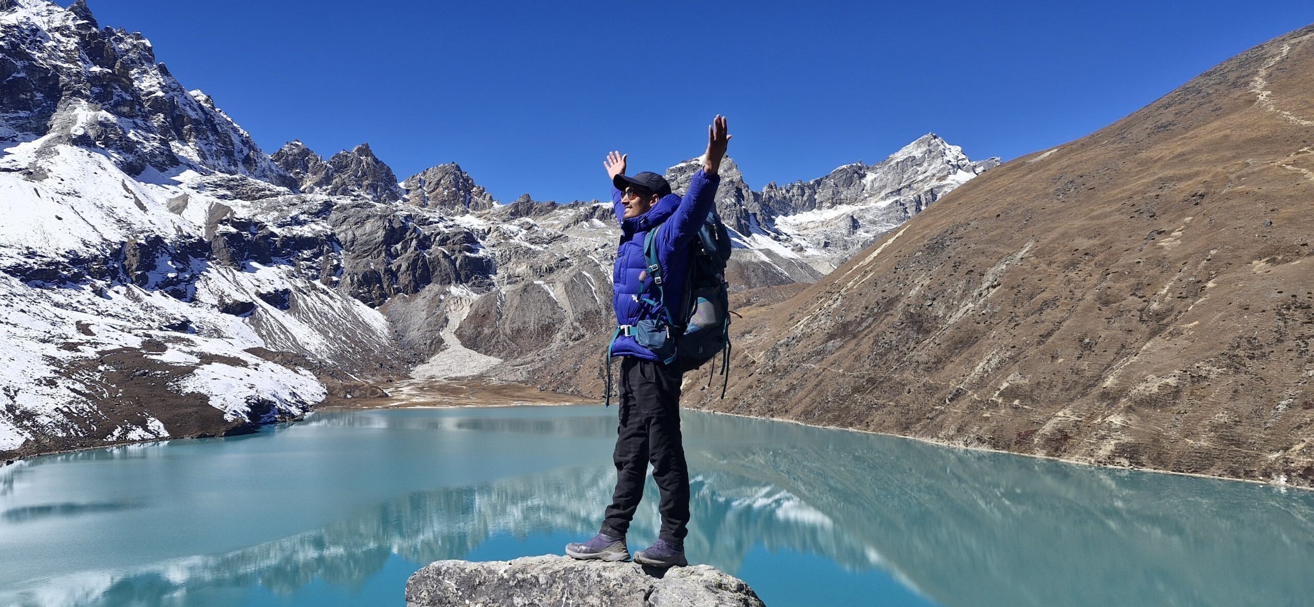 Mr. Gokarna Thapa is admiring the Gokyo lake & Gokyo valley.