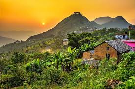 Sunsetting with golden color in Bandipur village with Thanimai hill on the background