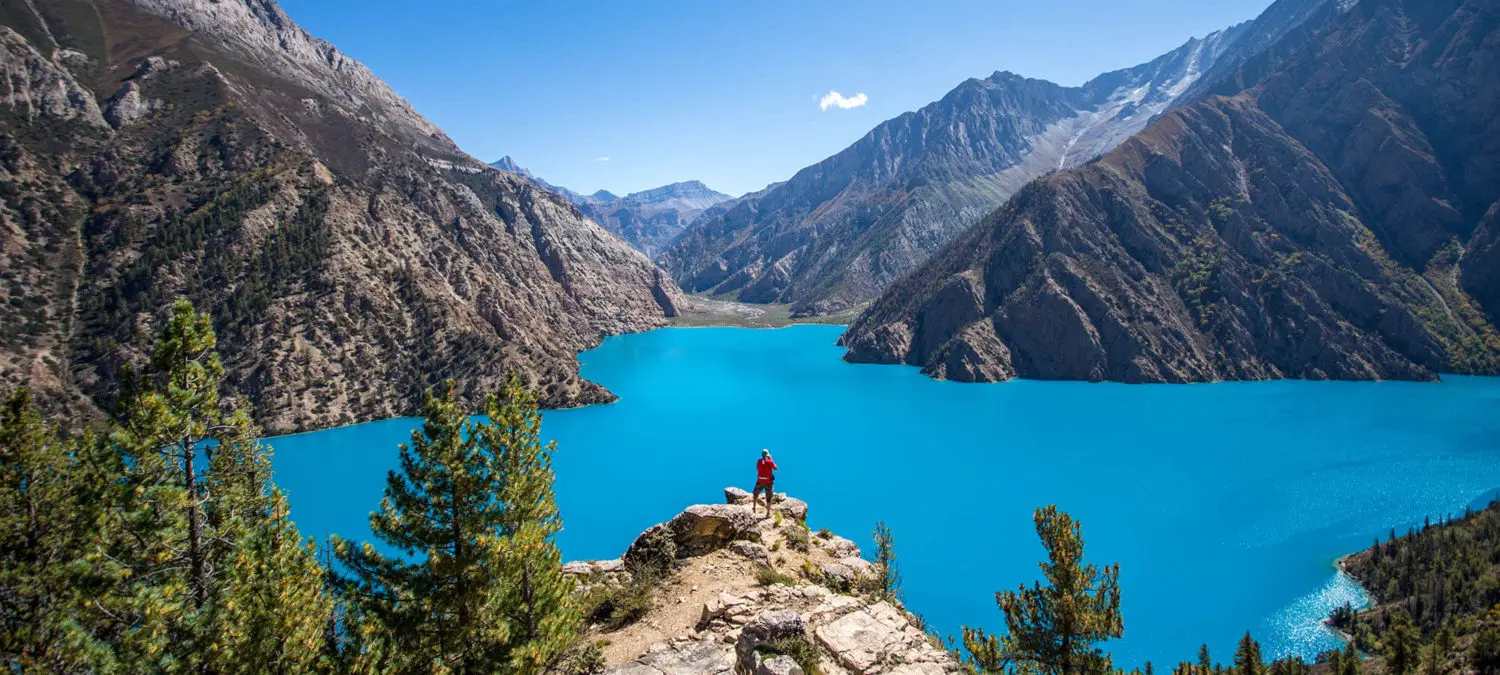 Shey Phoksundo Lake, a stunning alpine freshwater lake located within Nepal's Shey Phoksundo National Park in the Dolpa District.