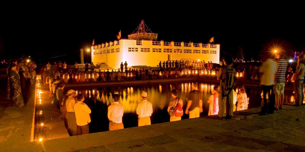 people praying around mayadevi temple